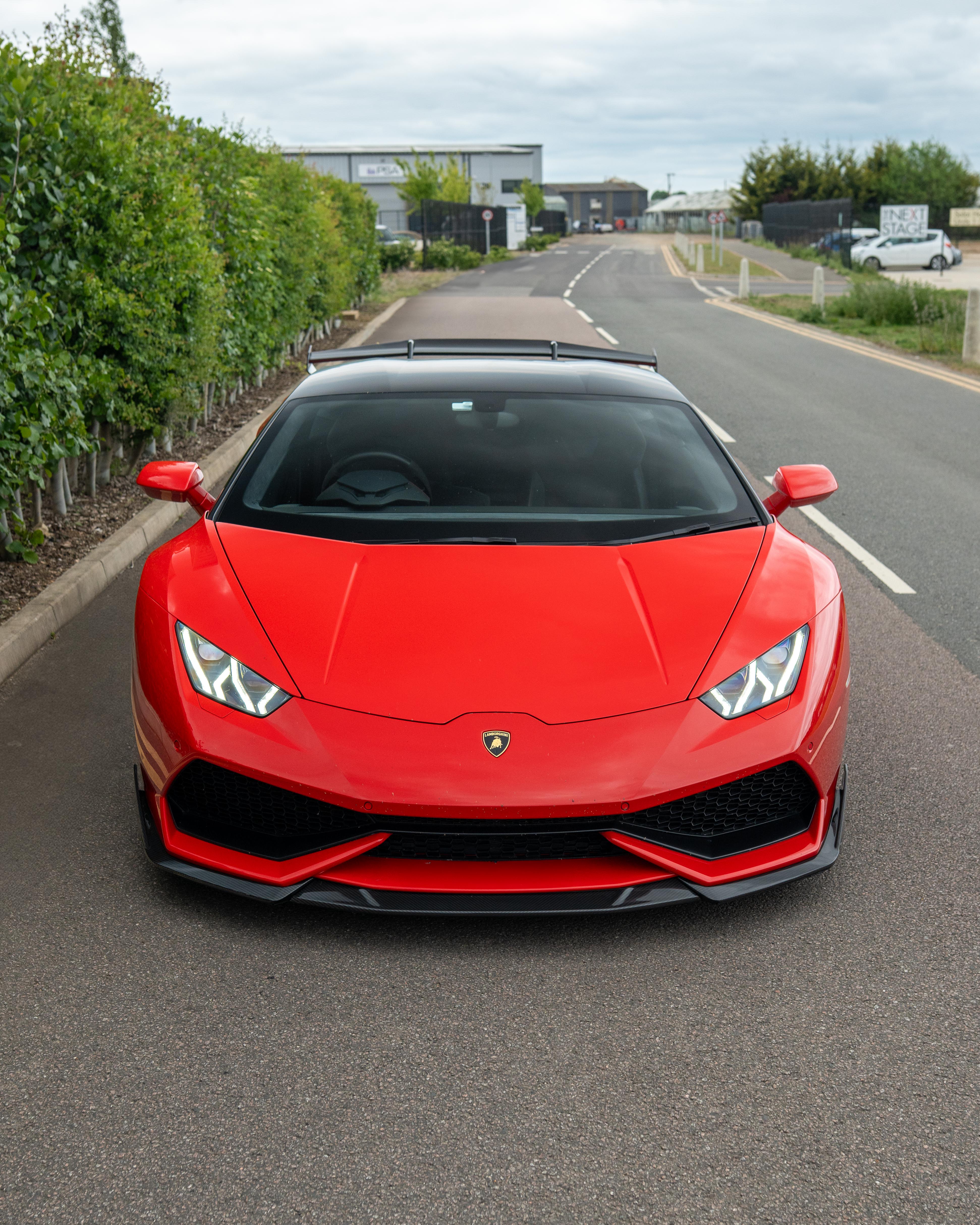 Lamborghini Huracan LP-610 carbon fibre splitter by CT Design, showing the sleek aerodynamic front splitter on the supercar.