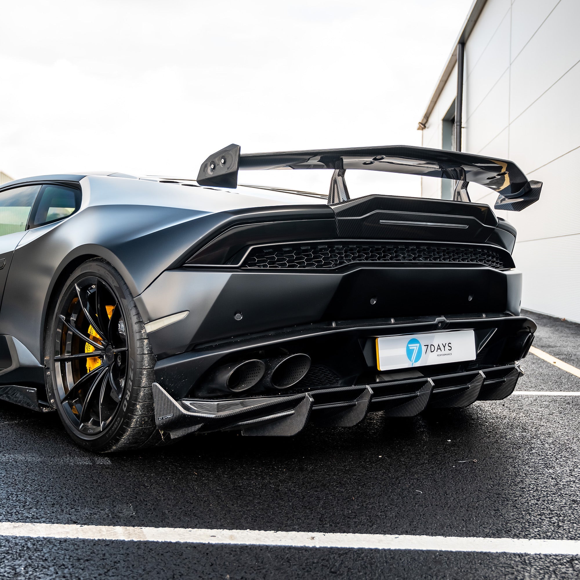 Lamborghini Huracan LP-610 carbon fiber full kit by CT Design, showing detailed carbon fiber parts and sleek automotive design.
