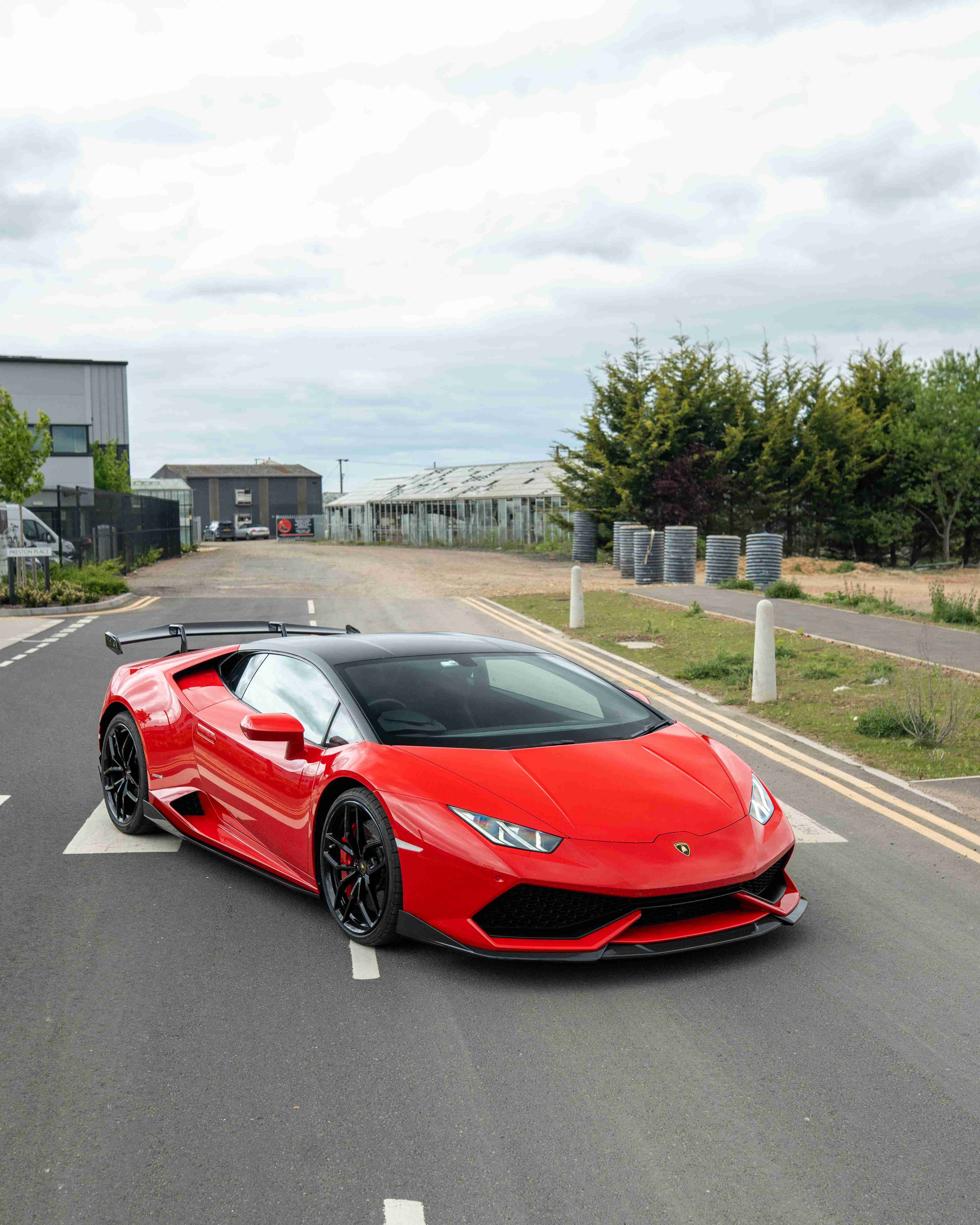 Lamborghini Huracan LP-610 carbon fibre full kit by CT Design, showcasing textured carbon fiber components on the sports car.