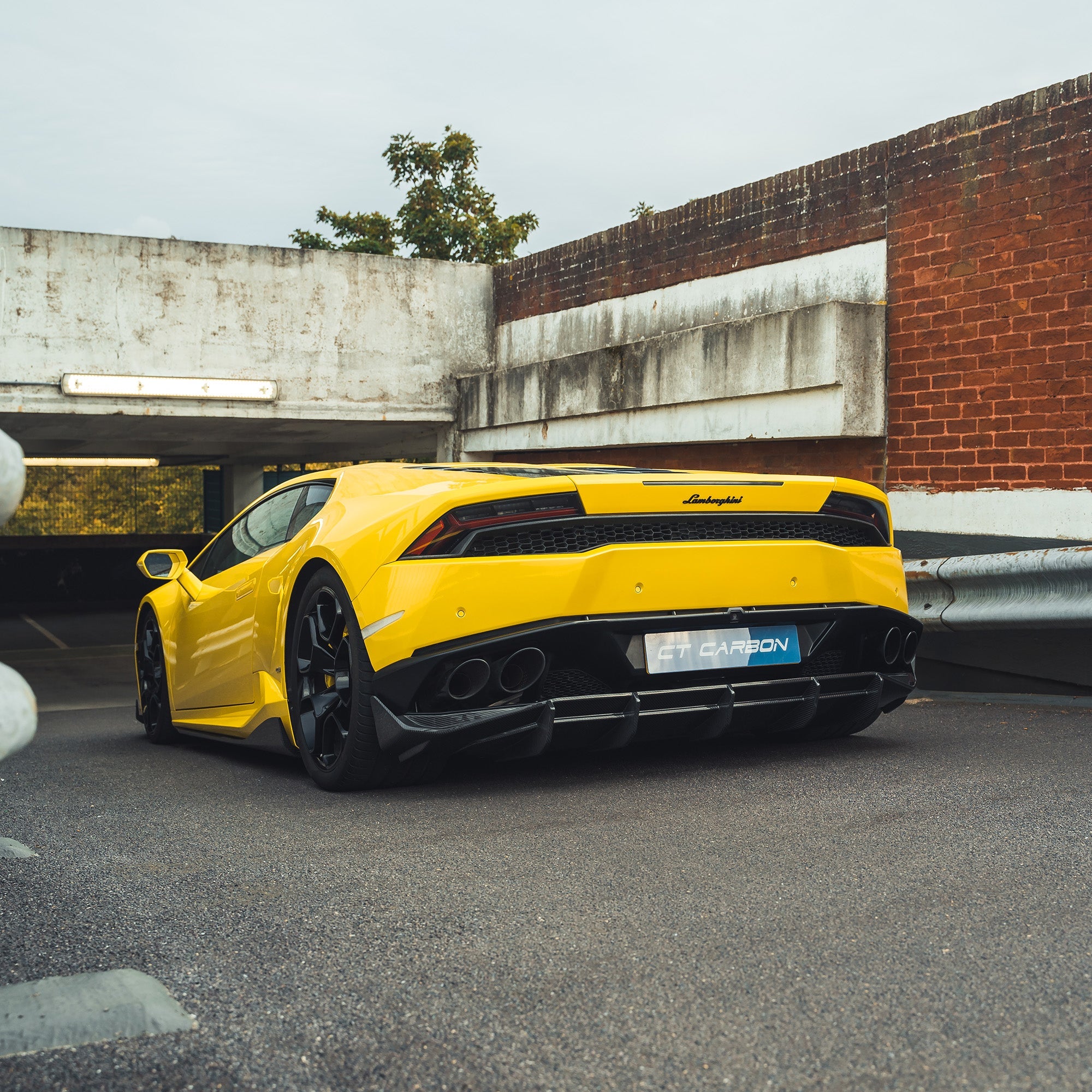Lamborghini Huracan LP-610 carbon fibre full kit by CT Design, showing detailed carbon fibre parts and sleek car body enhancements.