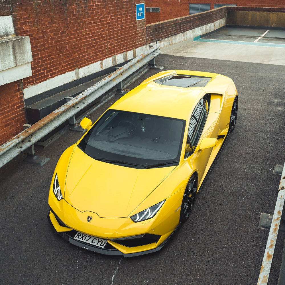 Lamborghini Huracan LP-610 carbon fibre splitter by CT Design, showing the sleek black aerodynamic front splitter on the car.