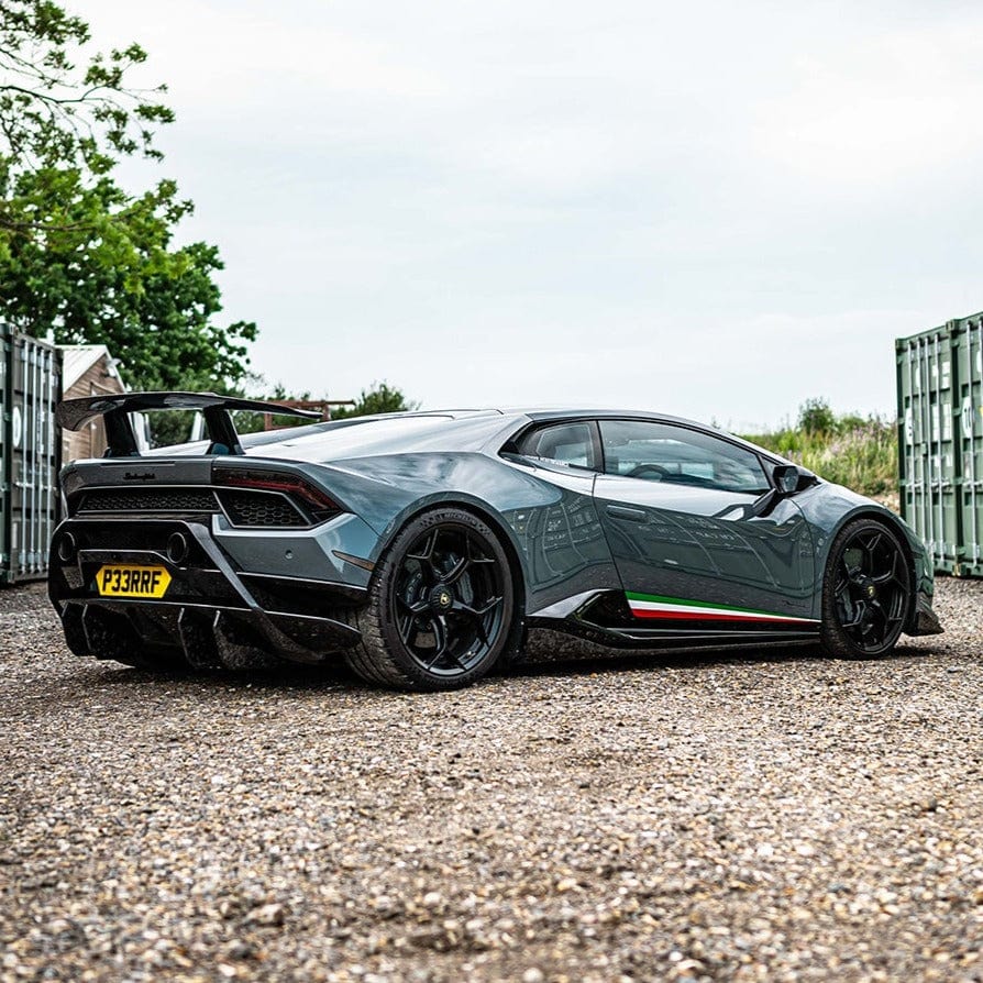 Lamborghini Huracan Performante full kit by CT Design with carbon fiber components, shown on a black sports car.