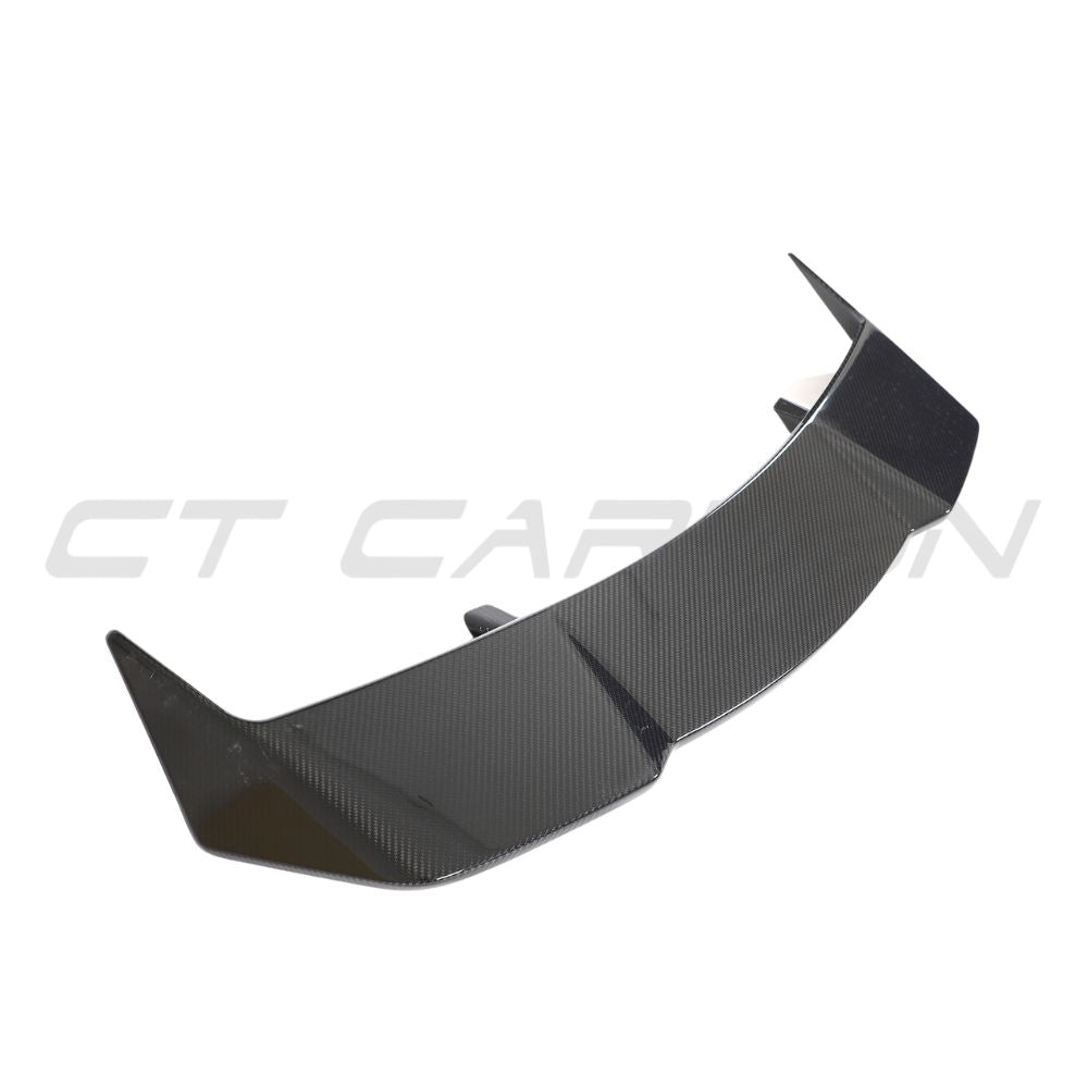 Lamborghini Urus carbon fiber roof spoiler by CT Design, showcasing sleek, lightweight aerodynamic enhancement on the vehicle roof.