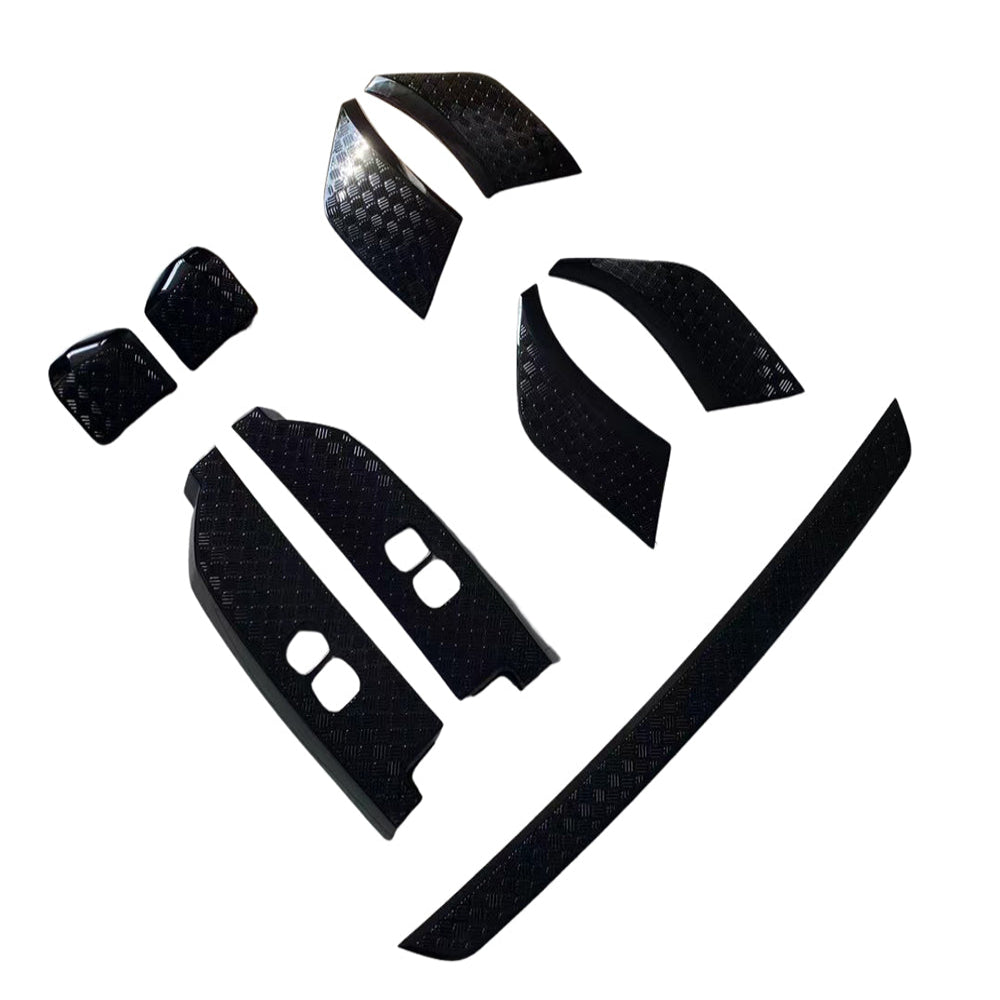 CT Carbon Land Rover Defender L663 110 gloss black anti-scratch trim kit, includes various protective trim pieces for vehicle enhancement.