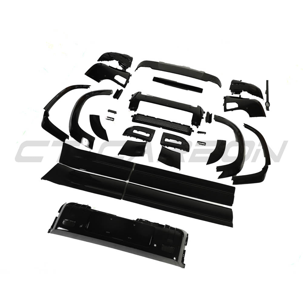 CT Carbon Land Rover Defender L663 110 wide arch gloss black kit installed on vehicle with sleek, wide arch design and black finish.