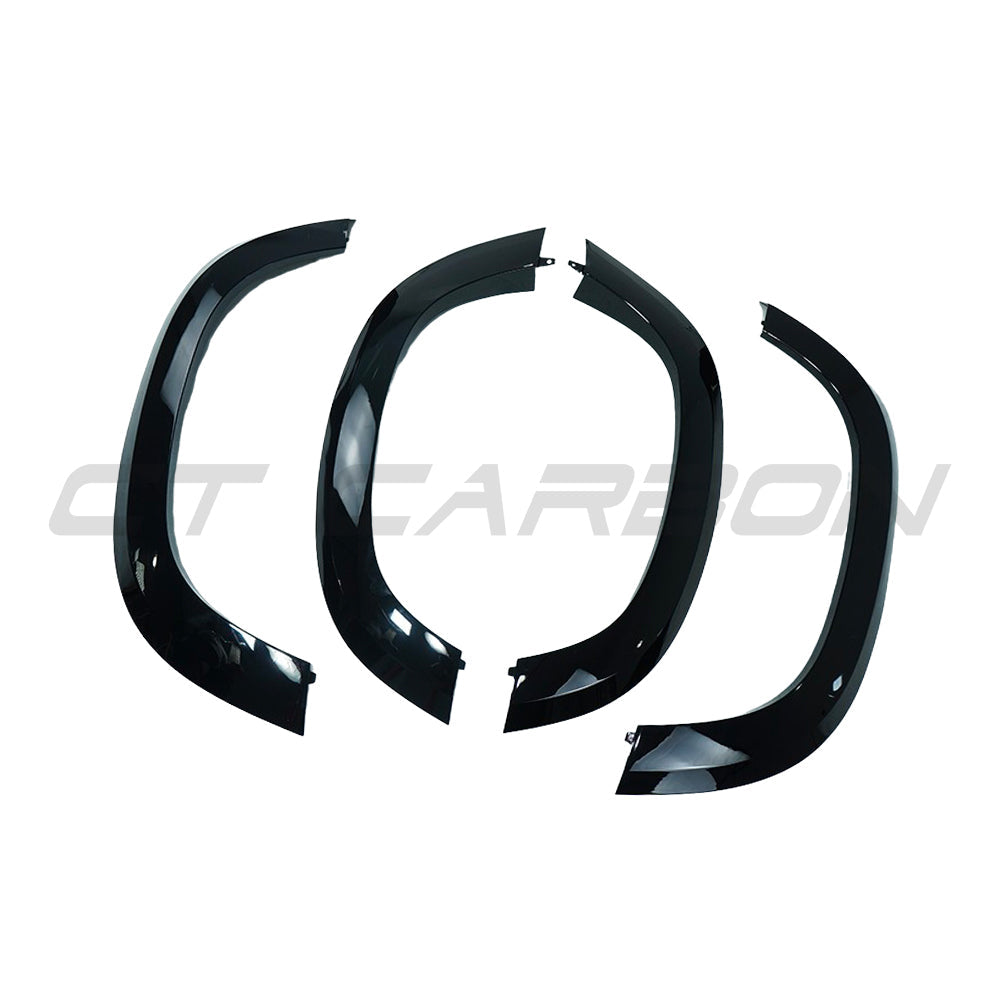 Gloss black wide arch fenders for Land Rover Defender L663 90 by CT Carbon, showcasing durable accessories with a sleek finish.