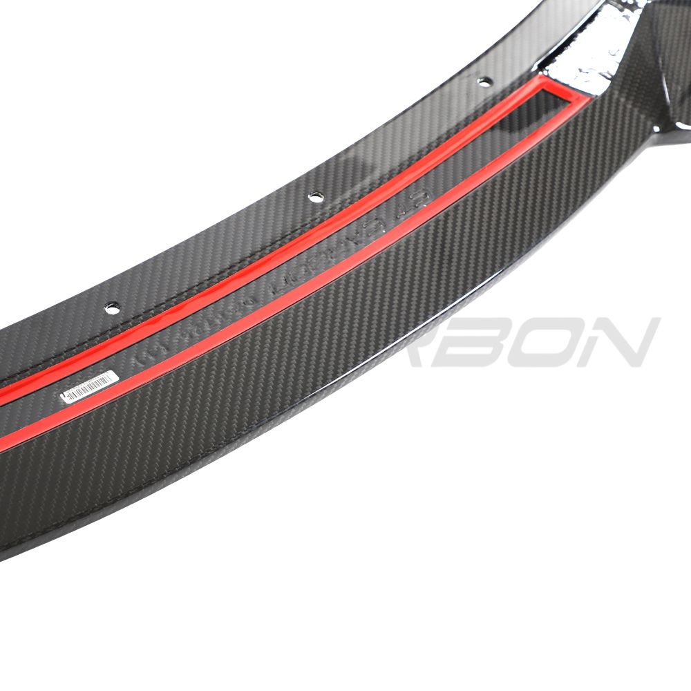 Lotus Emira full carbon fibre kit V2 front splitter by CT Design, showcasing lightweight carbon fiber with detailed aerodynamic design.