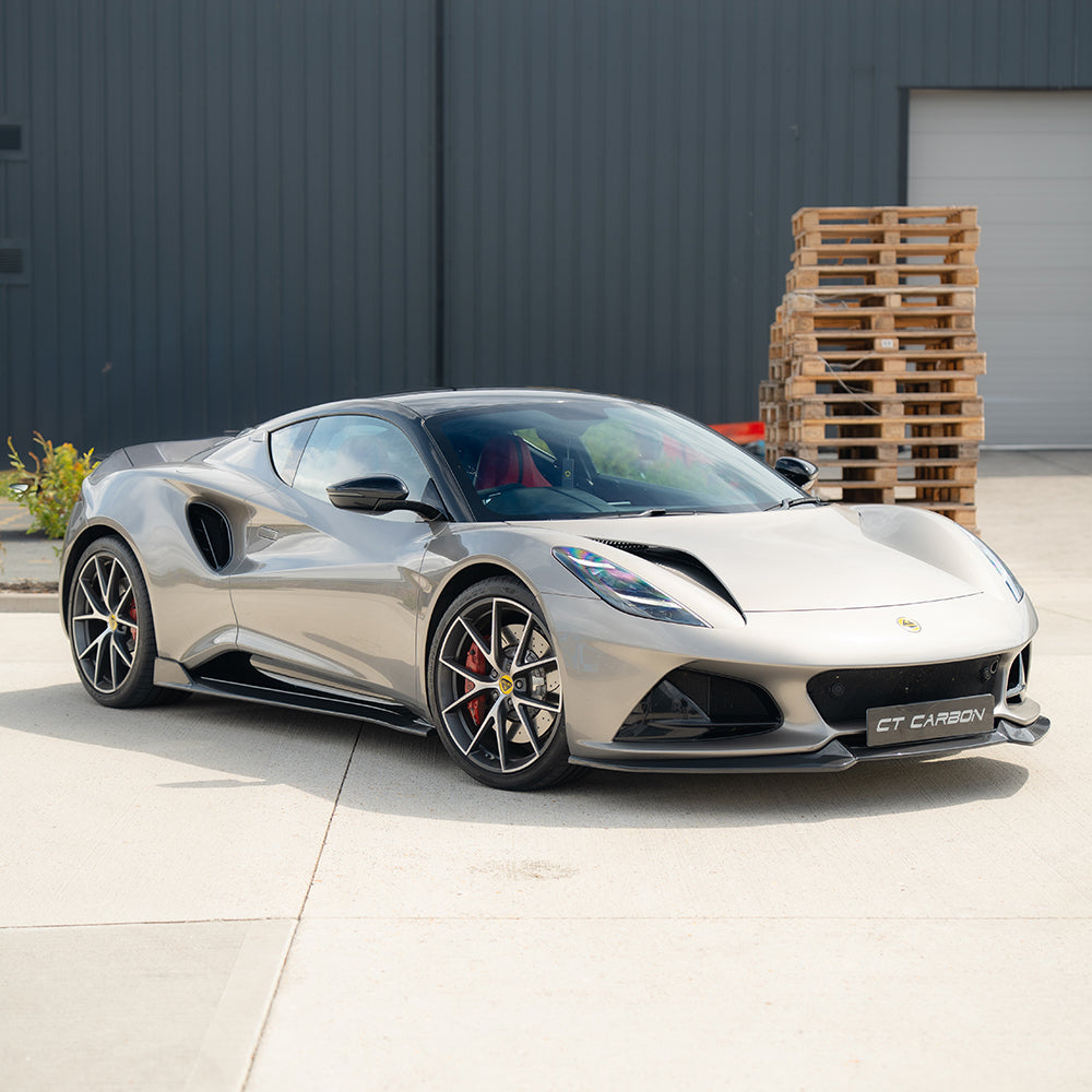 Lotus Emira 2022+ CT Design full carbon fibre side skirts kit, V1 version, showcasing sleek carbon fibre finish and detailed design.