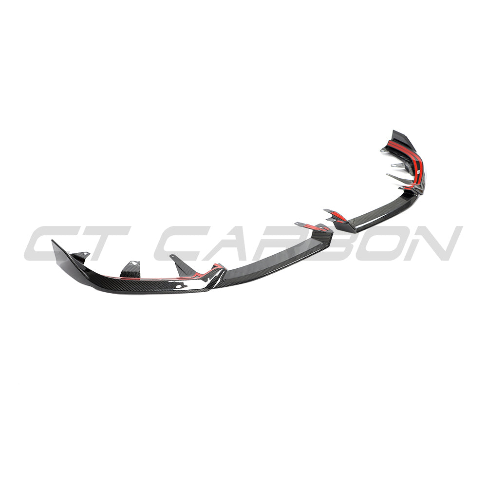 BMW 5 Series and i5 G60/G61 carbon fibre splitter by CT Carbon, shown installed on the front bumper for enhanced aerodynamics.