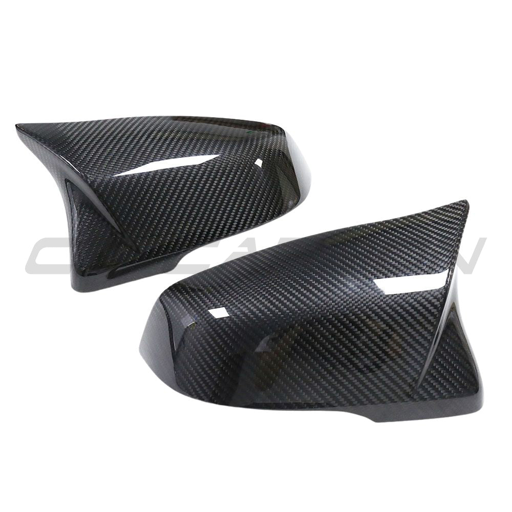 Toyota Supra A90 carbon fiber mirror accessories by CT Carbon, showing sleek, lightweight mirror covers with a glossy finish.