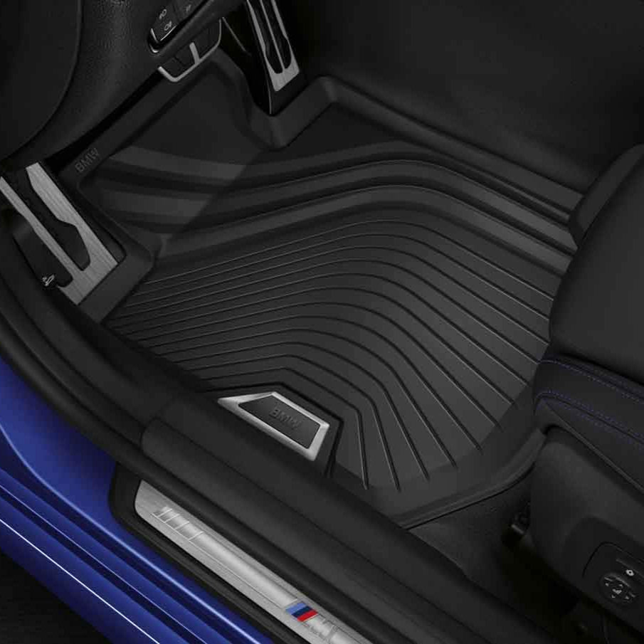 BMW Genuine rubber all-weather mats for G22 G82 interior, featuring durable, textured surface with raised edges for protection.