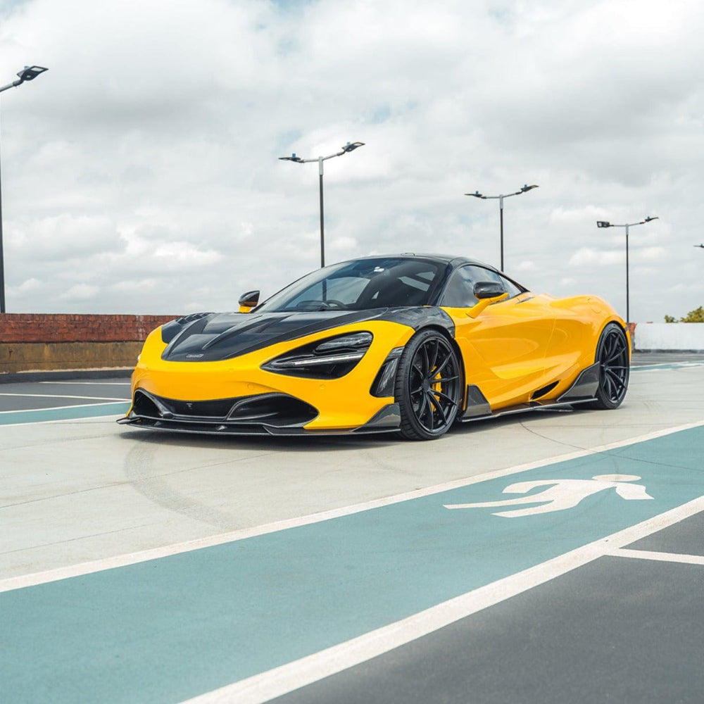 MCLAREN 720S carbon fiber splitter by CT Design, showing sleek aerodynamic design and textured carbon fiber surface.
