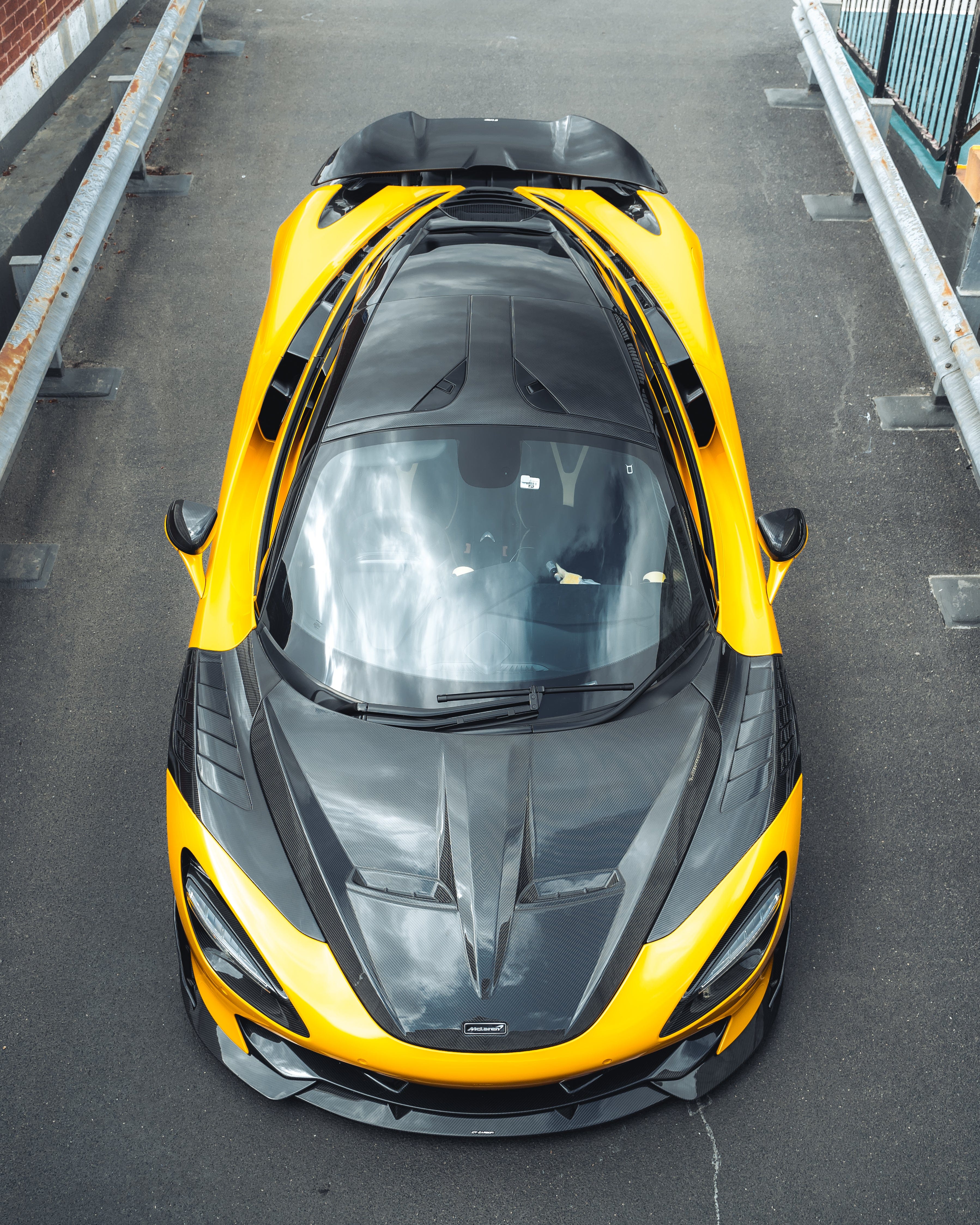 MCLAREN 720S carbon fibre spoiler by CT Design, showcasing sleek, lightweight aerodynamic car accessory with detailed carbon fibre weave.