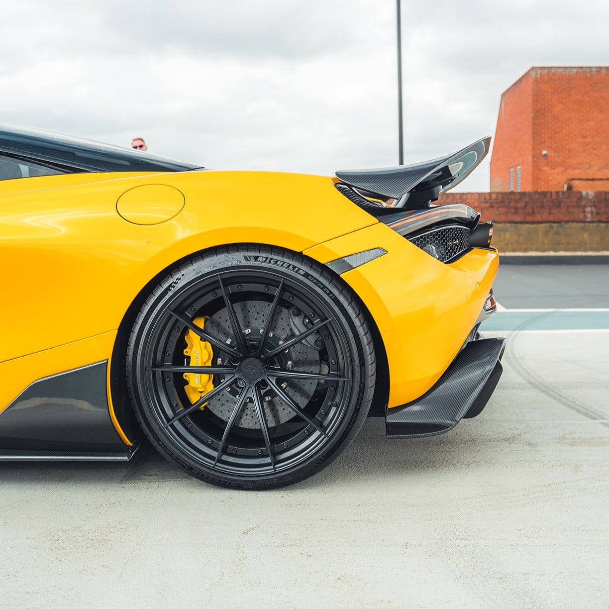 MCLAREN 720S full carbon fibre CT kit showing sleek, lightweight carbon components on a high-performance sports car.