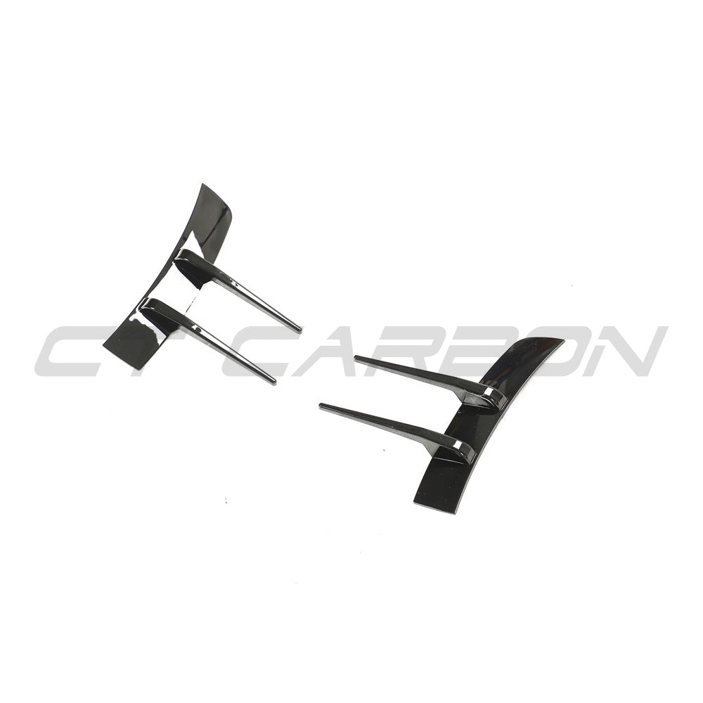 Gloss black Mercedes A-Class W177 V177 front bumper trim accessory by CT Carbon, shown on the vehicle's front bumper area.