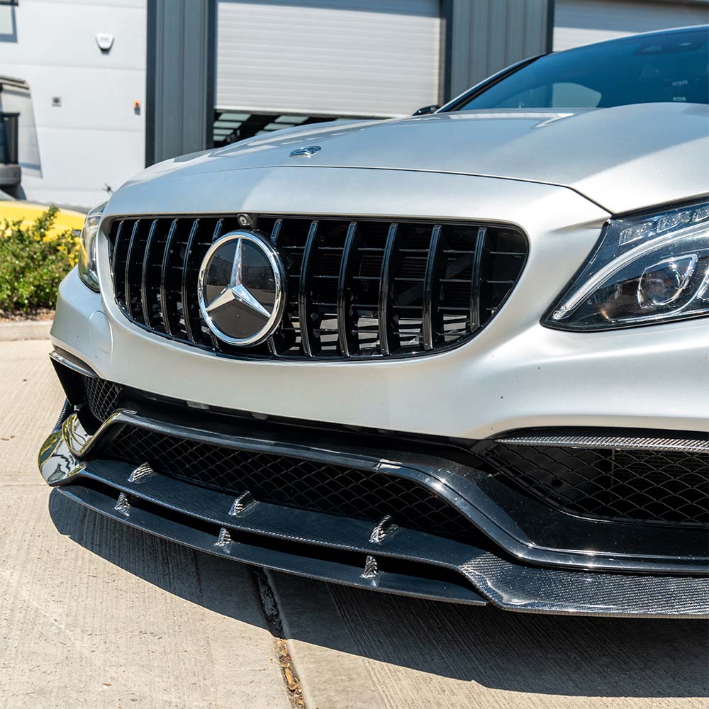 Mercedes C63 W205 coupe carbon fiber splitter V2 by CT Carbon, showcasing the sleek, lightweight design and aerodynamic details.
