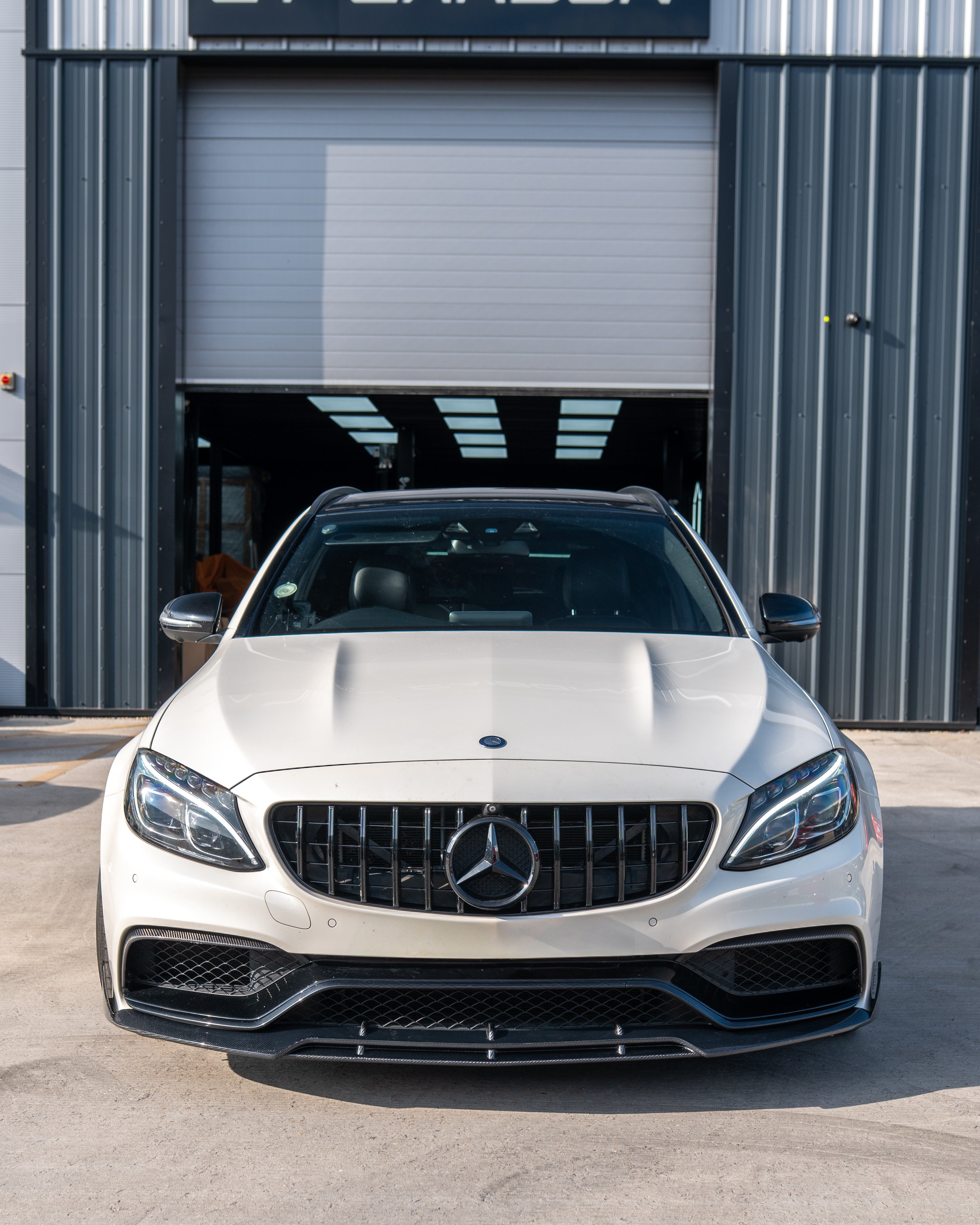 Mercedes W205 C63 AMG 2014-2018 grille with camera, black carbon fiber AMG GT style grille for sporty look and improved aerodynamics.