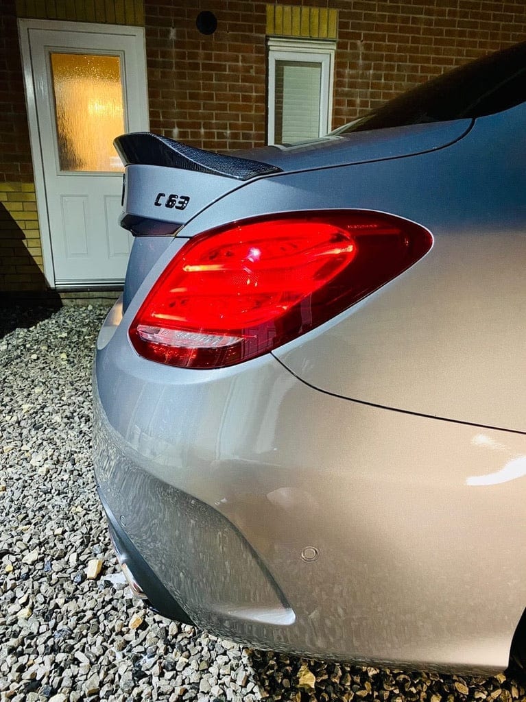 Mercedes C63/C-Class W205 saloon carbon spoiler by CT Carbon, showing sleek black aerodynamic rear spoiler design.