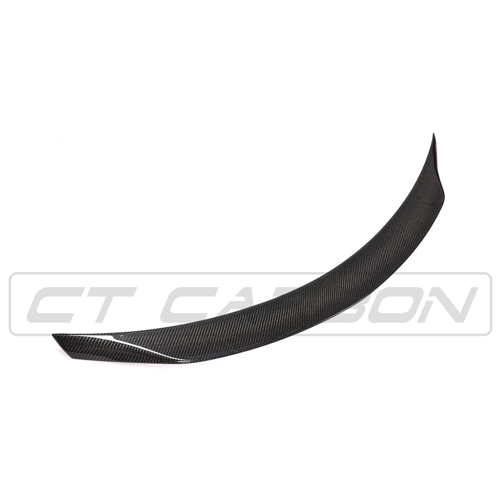 Mercedes C63 W205 saloon car carbon spoiler by CT Carbon, V2 design, with sleek black finish on the vehicle.