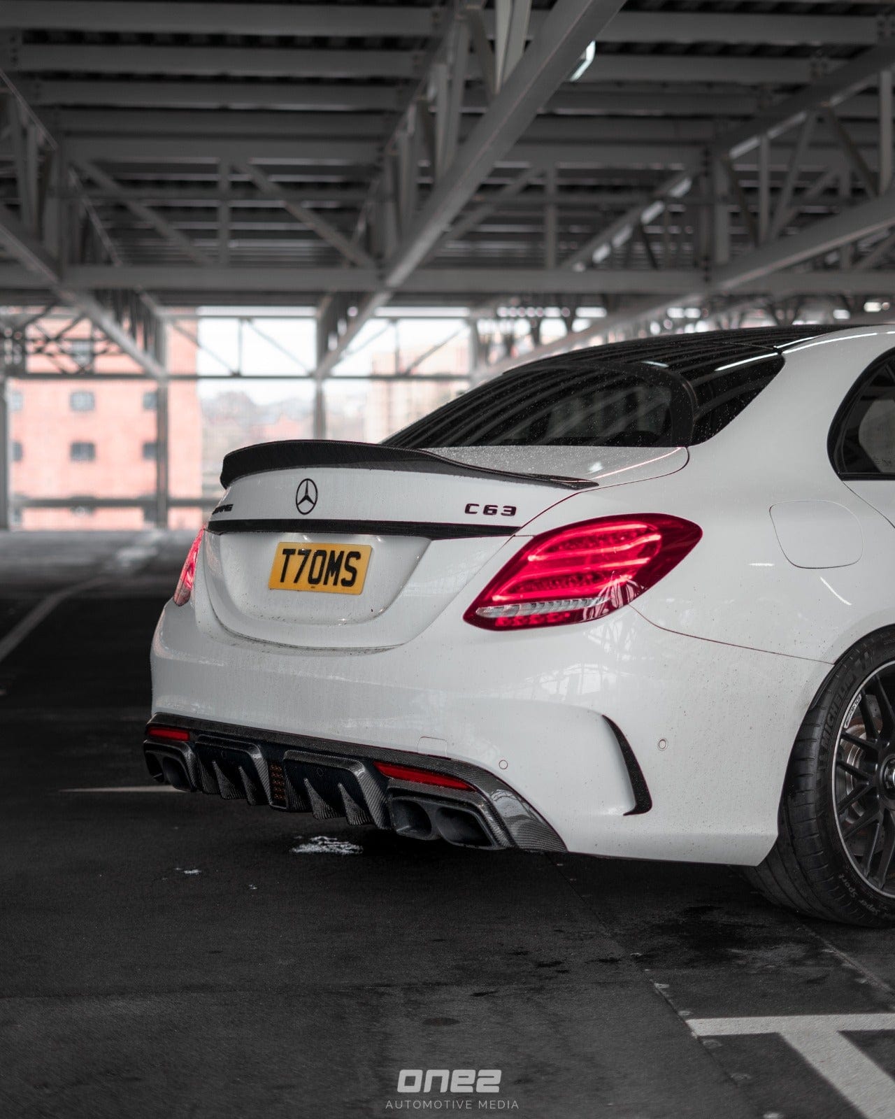 Mercedes C63/C63S W205 saloon carbon spoiler V1 by CT Carbon, featuring a ducktail design for sporty enhancement.