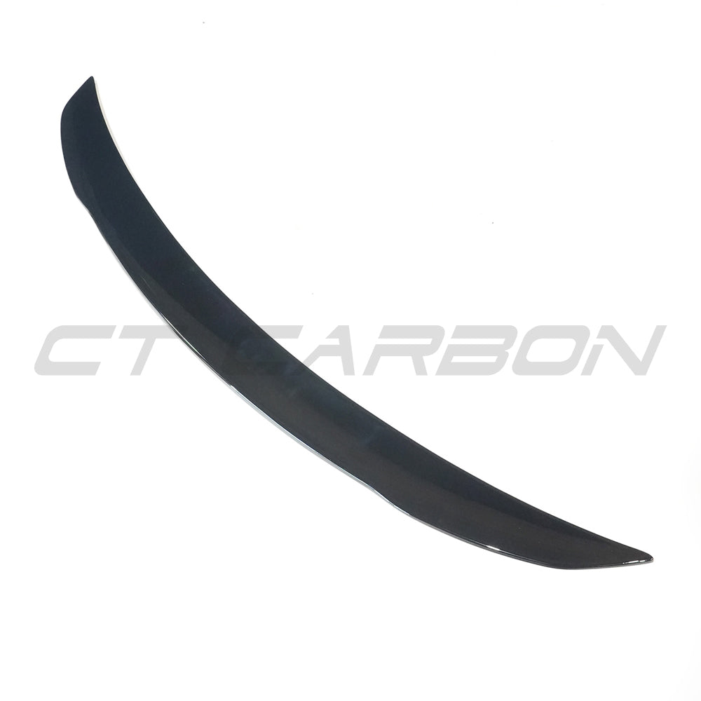 Gloss black Mercedes W118 CLA CT Carbon spoiler, showcasing sleek aerodynamic design and high-quality carbon fiber finish.