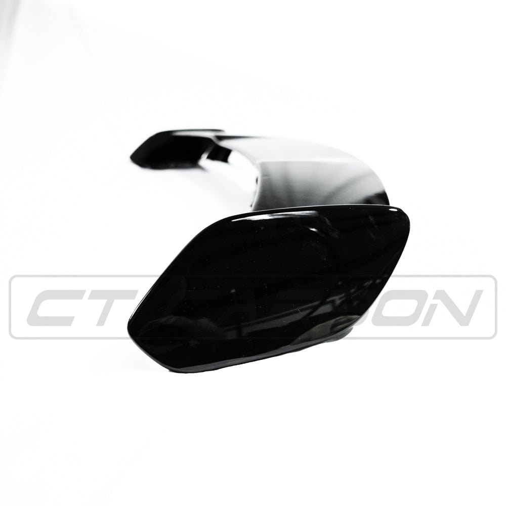 Mercedes W177 2018-2022 A-Class CT Carbon gloss black kit installed on vehicle, showcasing sleek black exterior accents.