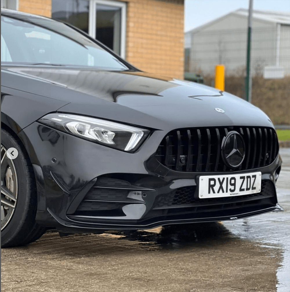 Gloss black front end pack for Mercedes W177/V177 A-Class by CT Carbon, featuring sleek automotive styling and detailed finishes.