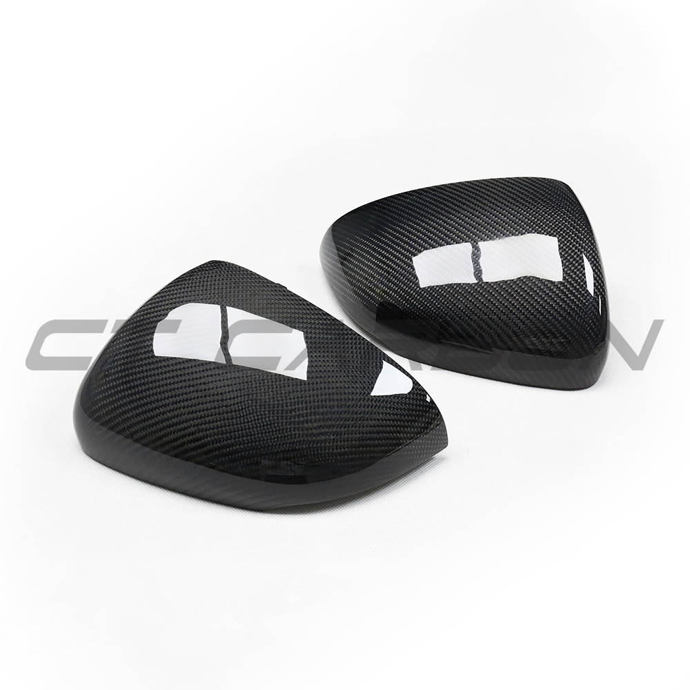Mercedes W177/V177 A-Class carbon fiber side mirrors by CT Carbon, showcasing sleek, textured carbon fiber finish on the mirrors.