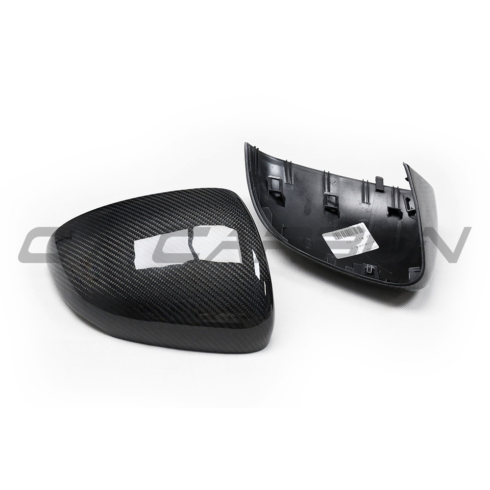 Mercedes W177/V177 A-Class carbon fiber mirrors by CT Carbon, close-up view showing sleek black finish and aerodynamic design.