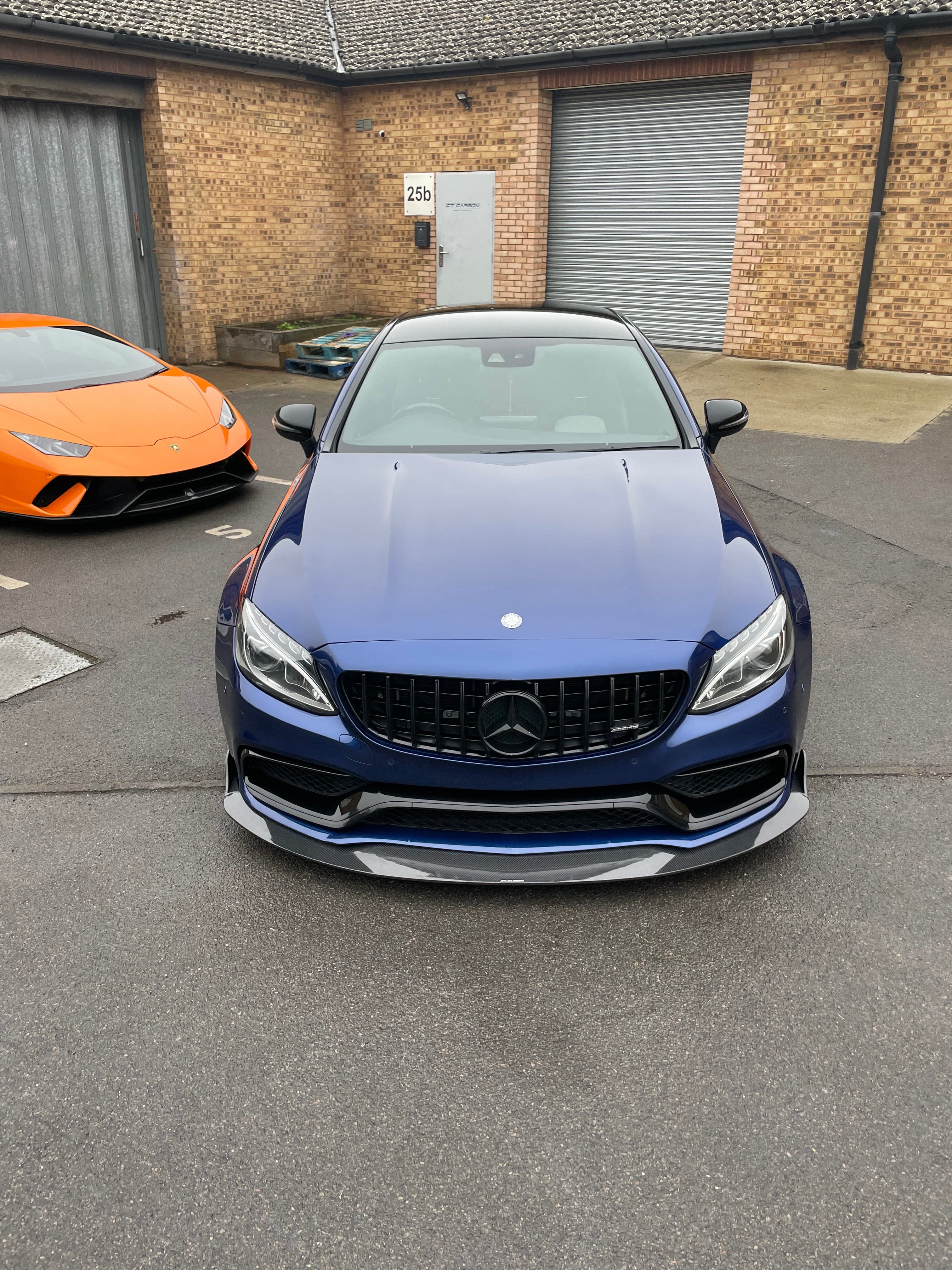 Mercedes W205 C63 coupe convertible carbon fibre splitter by CT Carbon, V3 design, showcasing sleek aerodynamic enhancement.