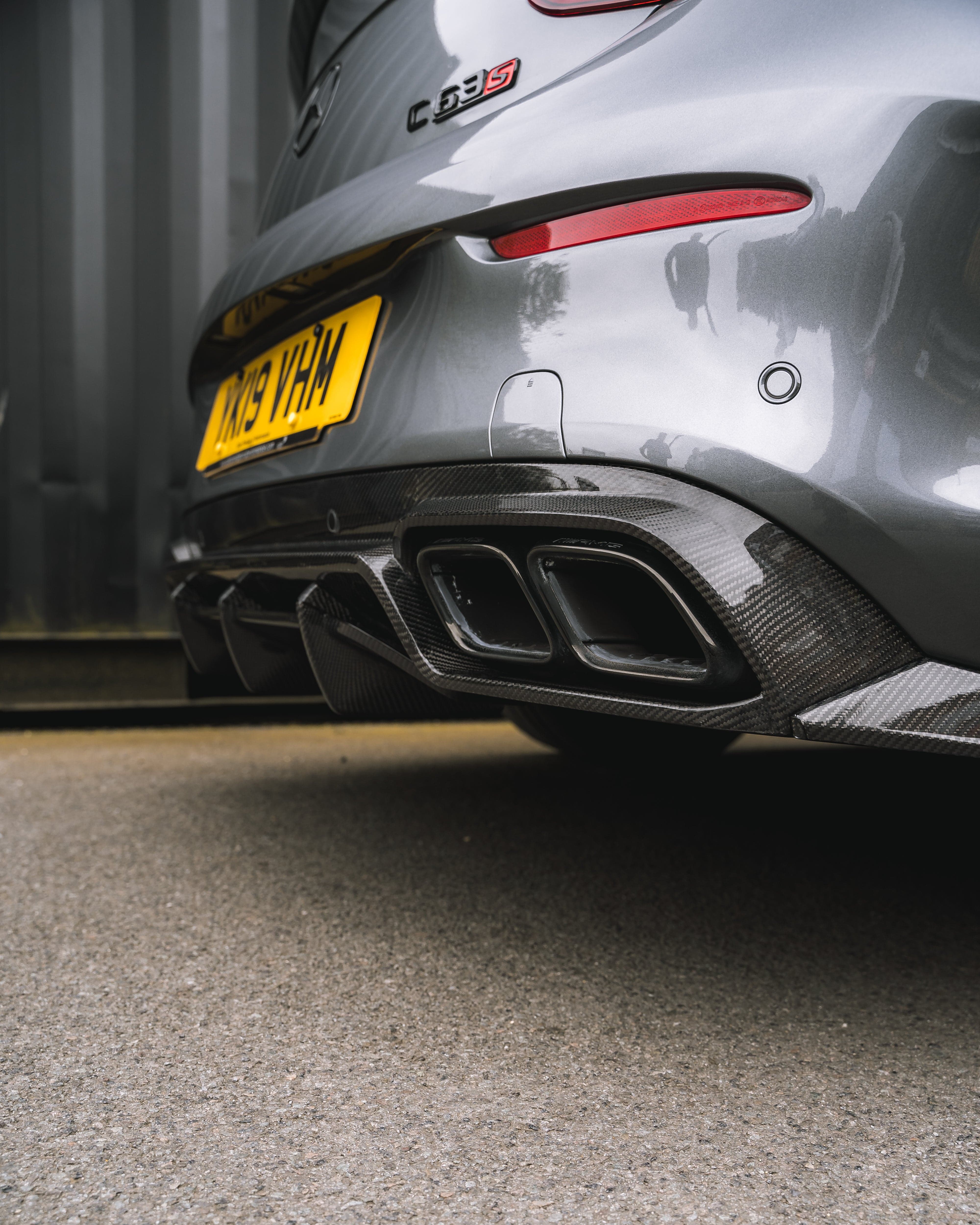 Mercedes W205 C63 facelift coupe and convertible carbon fibre diffuser by CT Design, showcasing sleek automotive styling.