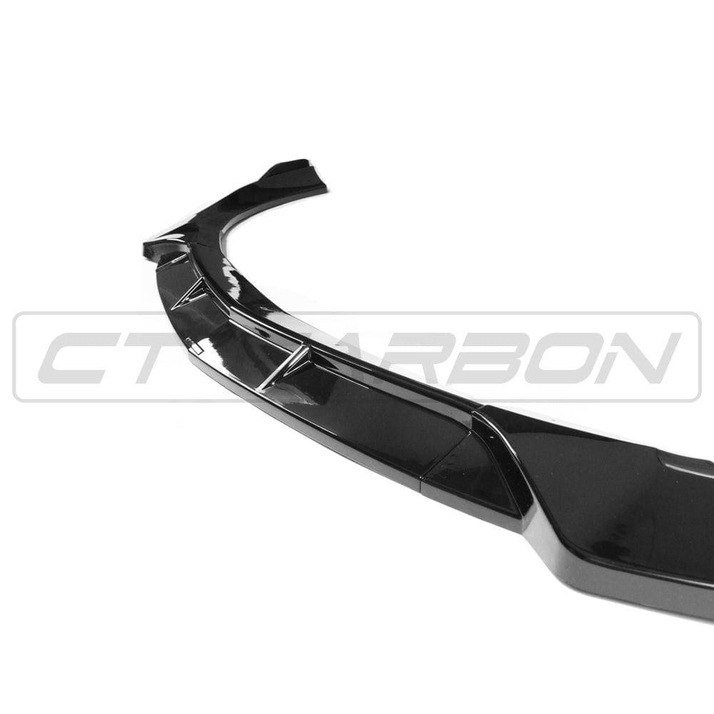 Mercedes W213 and C238 2017-2020 E-Class CT Carbon gloss black splitter installed on the front bumper.