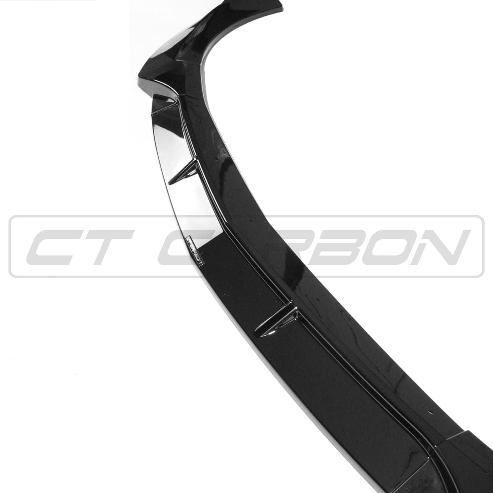 Gloss black CT Carbon splitter installed on a Mercedes W213 and C238 2017-2020 E-Class, showing its sleek aerodynamic design.