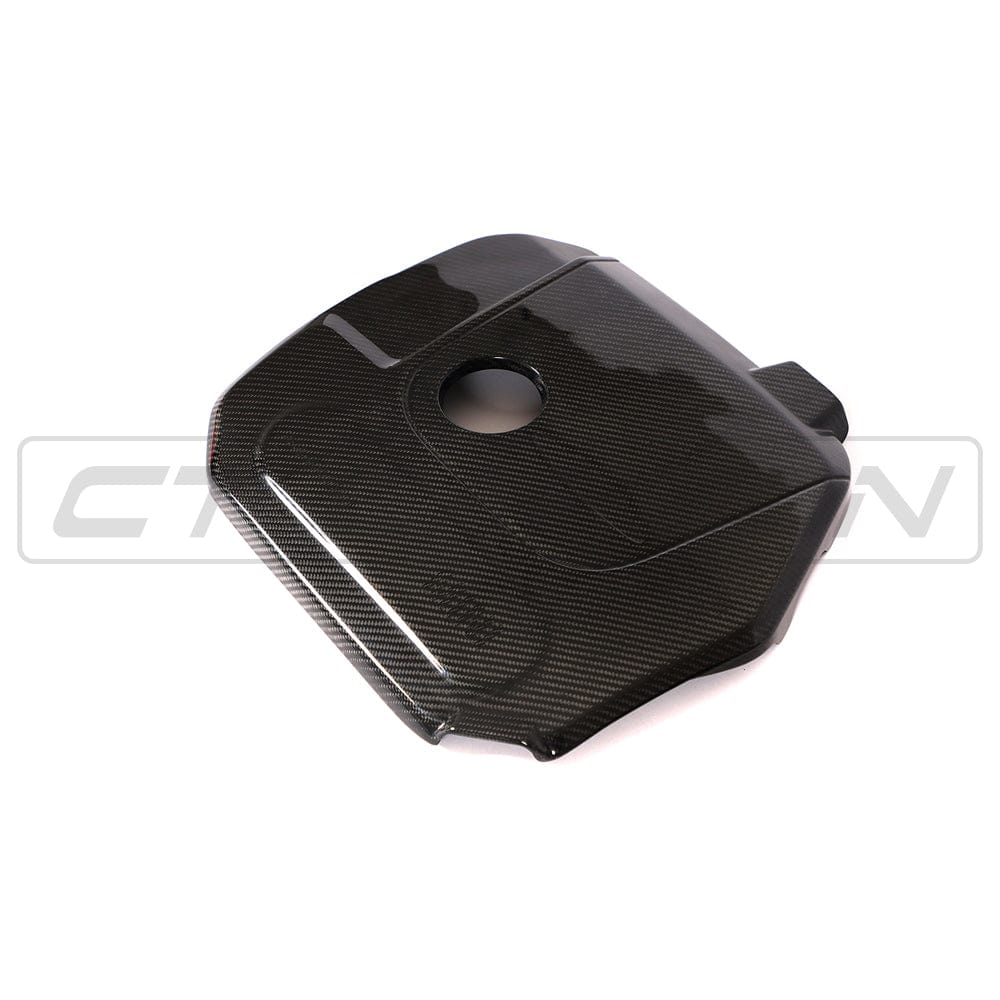 Carbon fiber engine cover for MINI Cooper S and JCW F56 by CT Carbon, showcasing a sleek, lightweight accessory for engine bay enhancement.