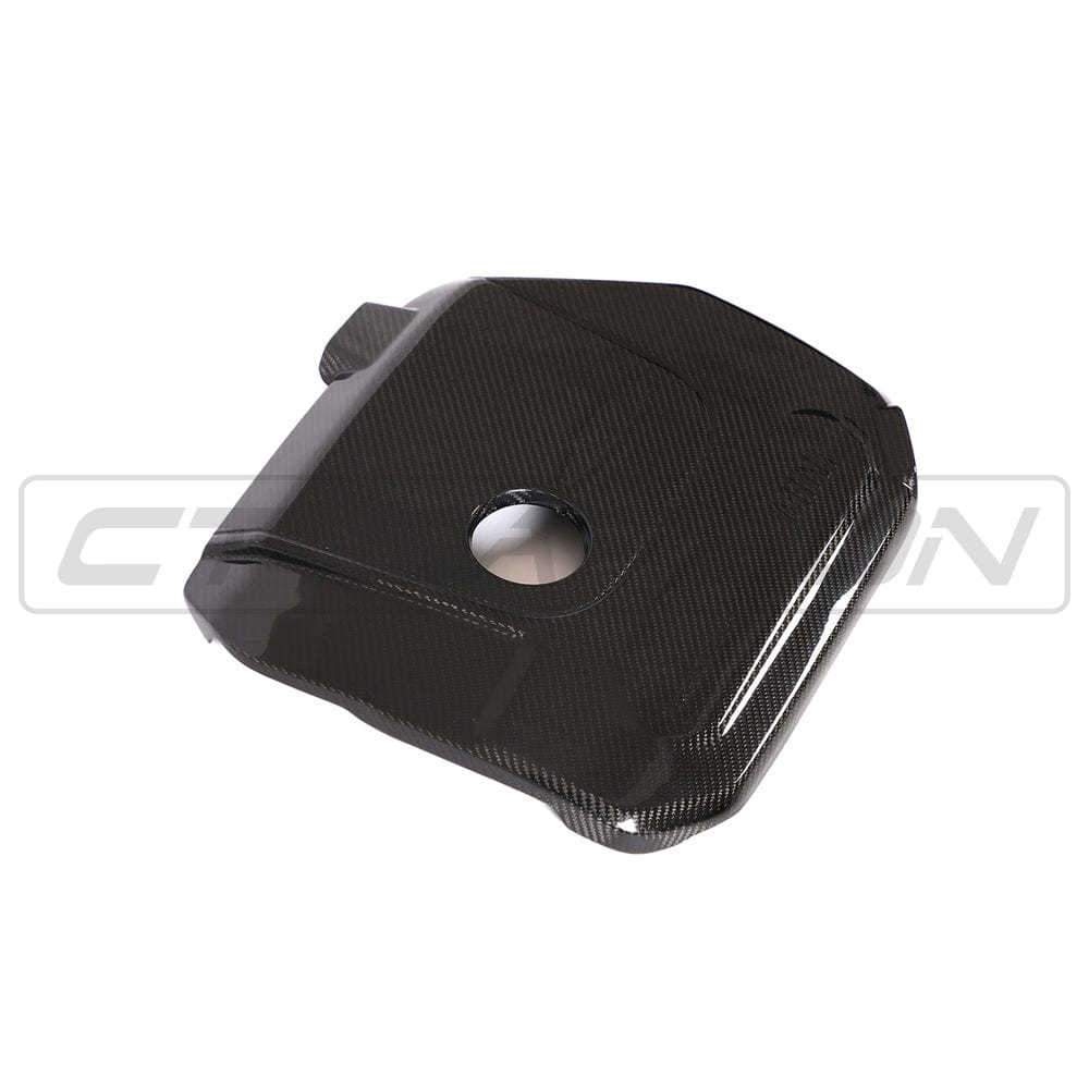 Mini Cooper S JCW F56 carbon fiber engine cover by CT Carbon, showcasing sleek, lightweight engine protection accessory.
