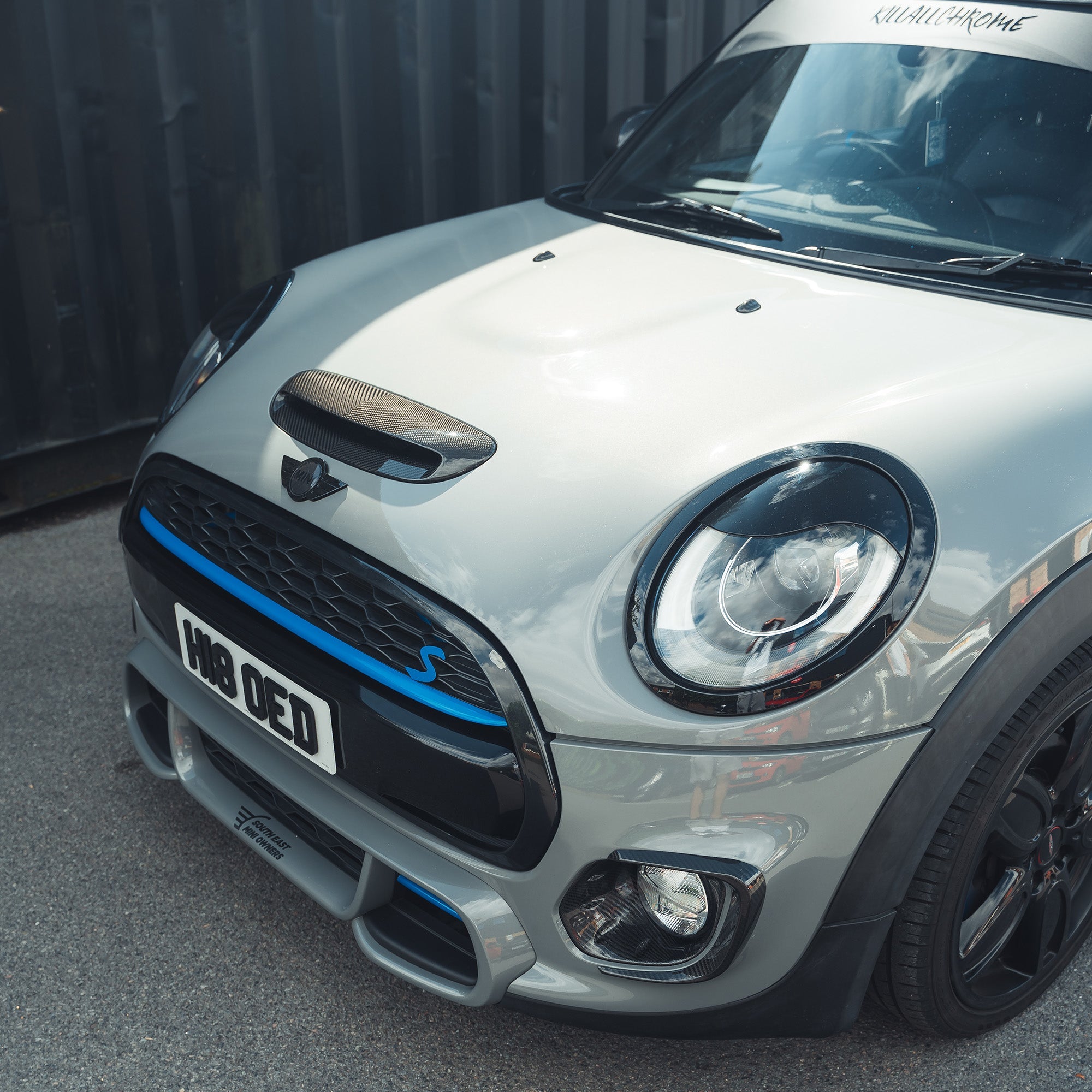Set of four carbon fiber fog light covers for MINI Cooper S / JCW F56, by CT Carbon, showcasing sleek textured finish.