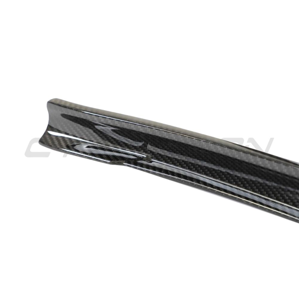 Porsche 911 992 Carrera carbon fibre side skirts by CT Design, showing sleek aerodynamic design on the car's sides.
