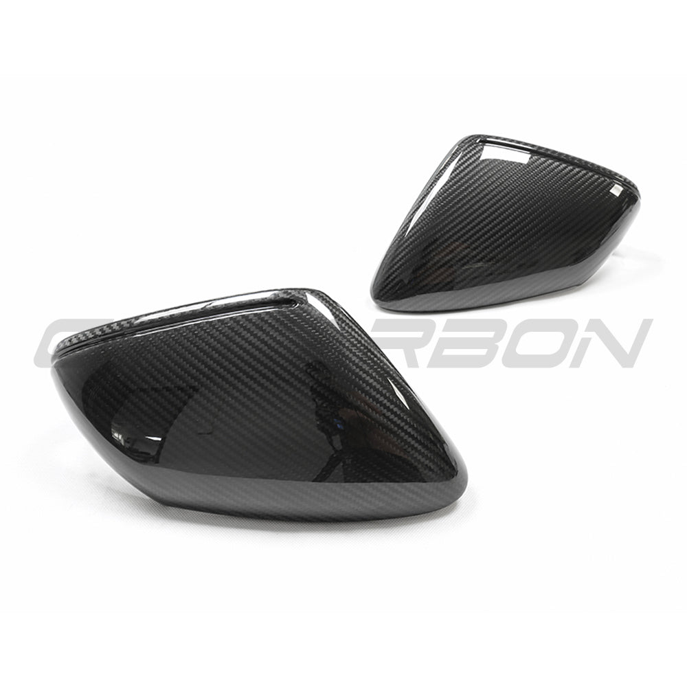 Porsche 911 992 carbon fiber side mirrors by CT Carbon, RHD compatible, featuring sleek carbon fiber finish and aerodynamic design