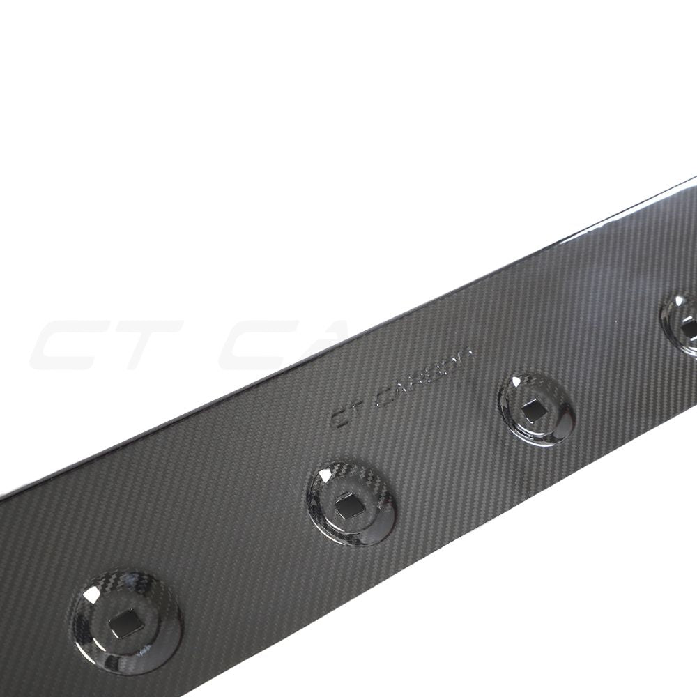 Porsche 911 992 Turbo S carbon fibre side skirts by CT Design mounted on the vehicle, showcasing sleek aerodynamic design.