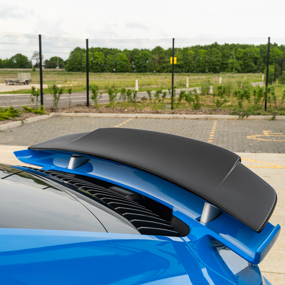 Porsche 911 (992) Turbo S full carbon fibre kit including rear spoiler, designed by CT Design, with detailed carbon fibre finish.