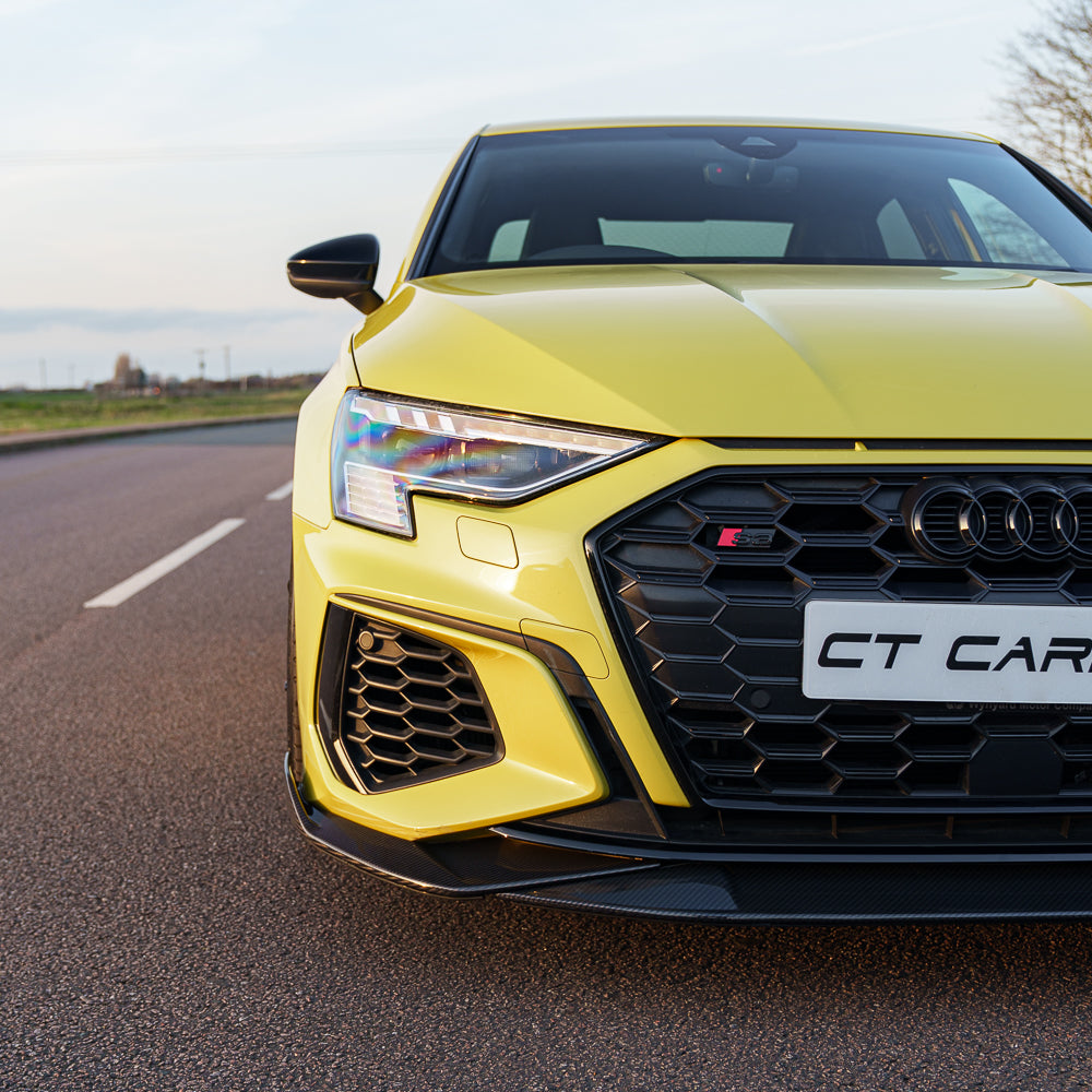 Python Yellow Audi A3/S3 8Y saloon with CT Carbon V3 full carbon fibre kit, showcasing sporty exterior enhancements.