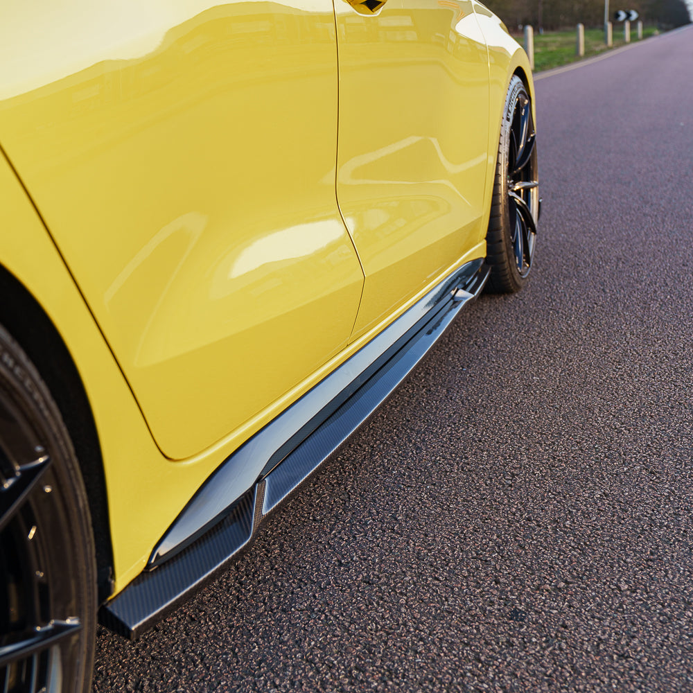 Python Yellow Audi A3/S3 8Y saloon with CT Carbon full carbon fiber kit, V3, showcasing sleek carbon fiber accents on the car.