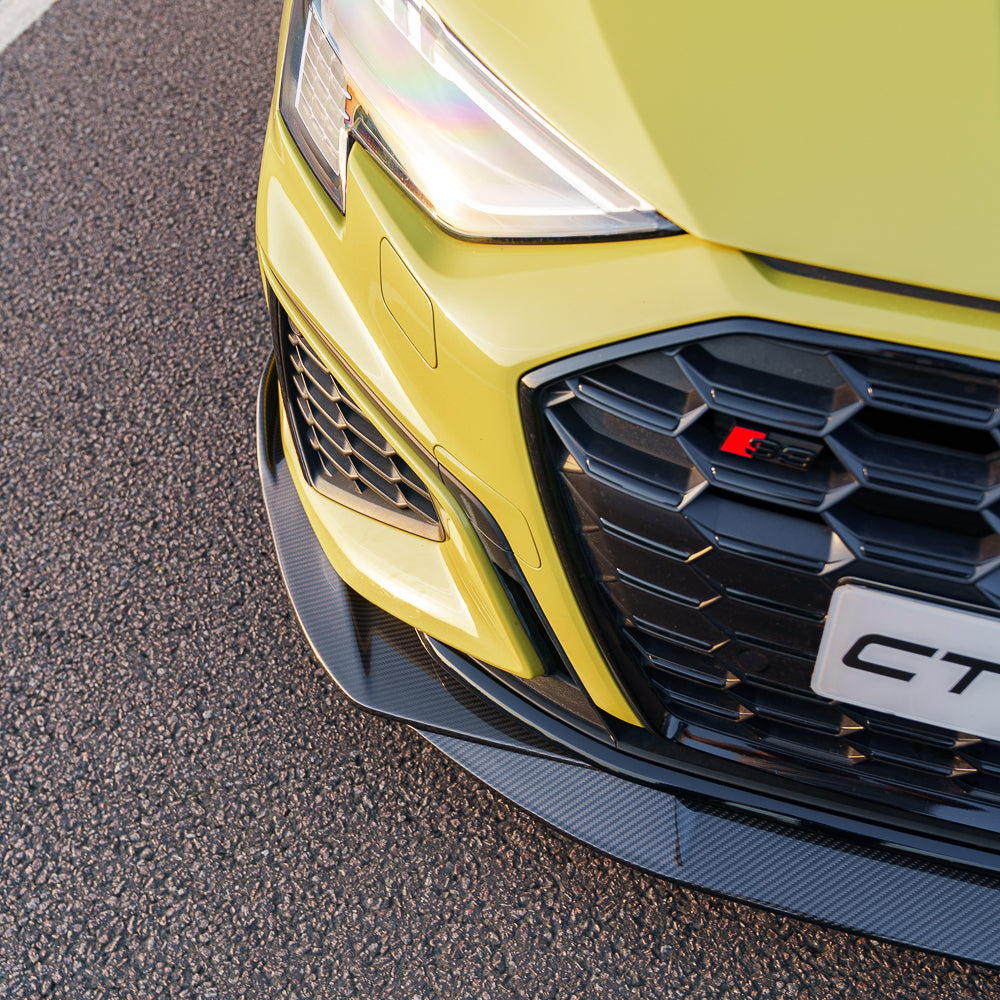 Python yellow Audi A3 S3 8Y saloon with CT Carbon V3 full carbon fibre kit, showing hood, side skirts, and rear spoiler.