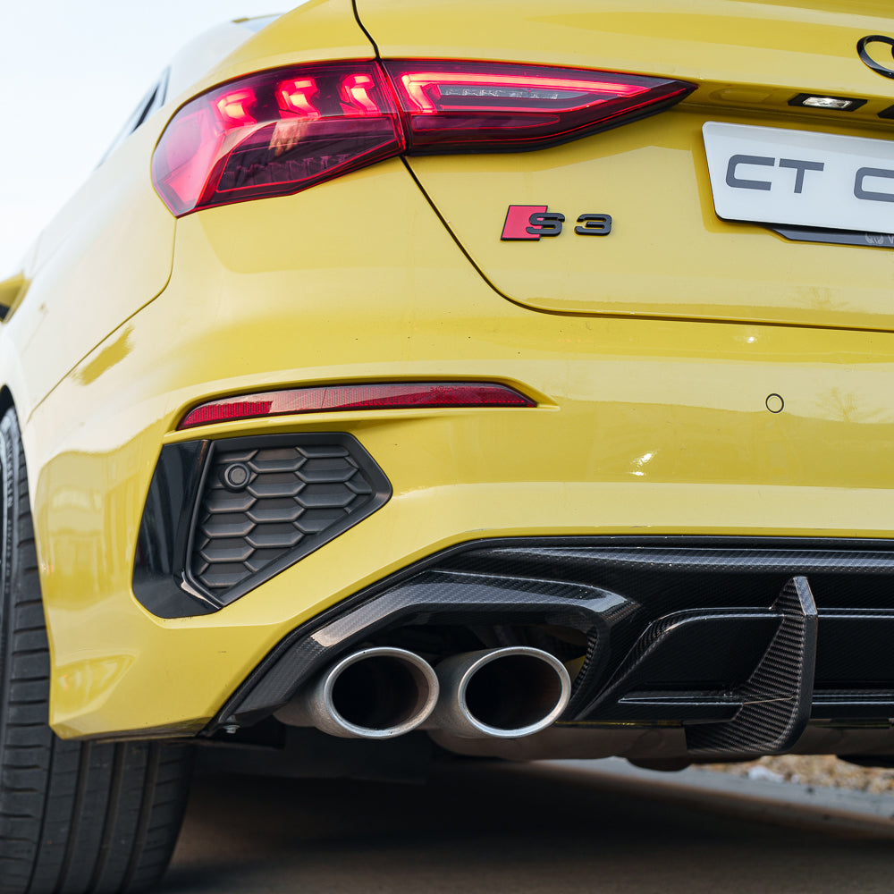 Python yellow Audi A3/S3 8Y saloon with CT Carbon V3 full carbon fibre kit, showcasing aerodynamic panels and sleek design.