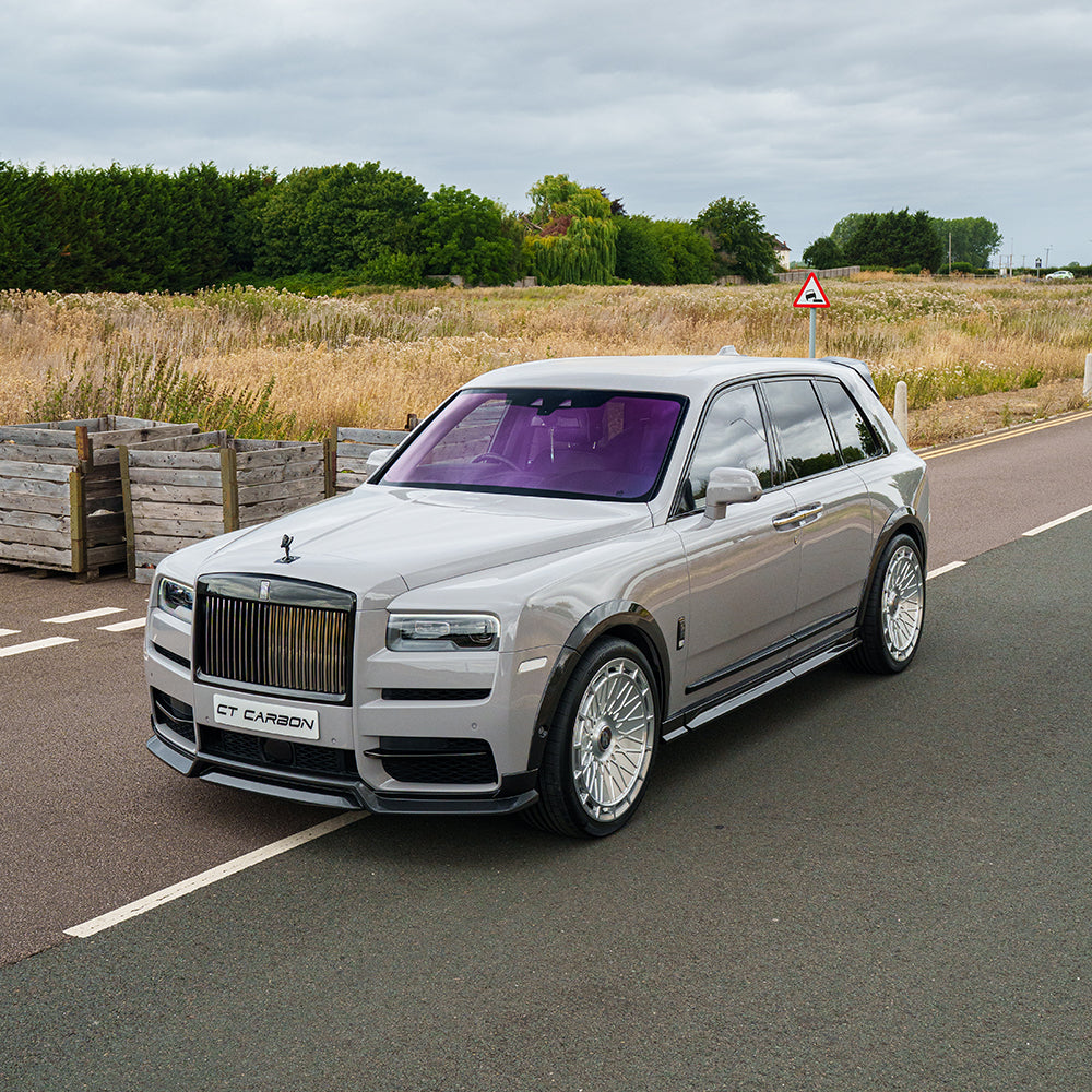 Rolls Royce Cullinan carbon fibre side skirts by CT Carbon, showcasing sleek, lightweight splitter design for luxury SUV styling.