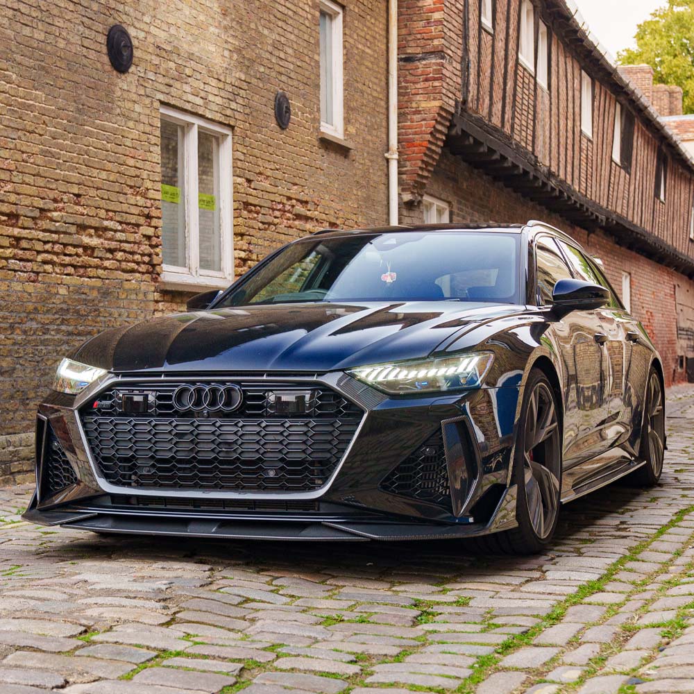 Full car carbon fiber kit for Audi RS6 C8 by CT Carbon, showing detailed carbon fiber panels on the vehicle's exterior.