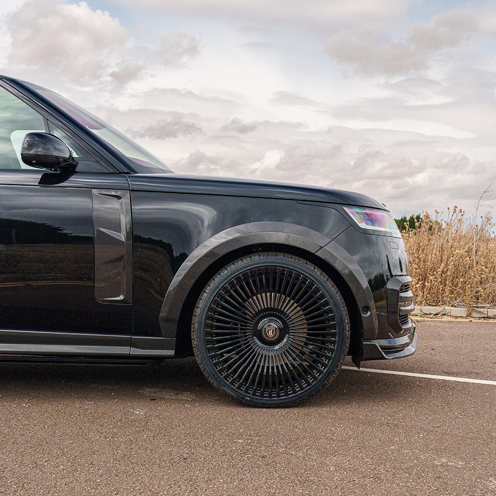 Range Rover L460 2022+ CT Carbon carbon fibre side skirts, sleek aerodynamic enhancements for vehicle side profile.