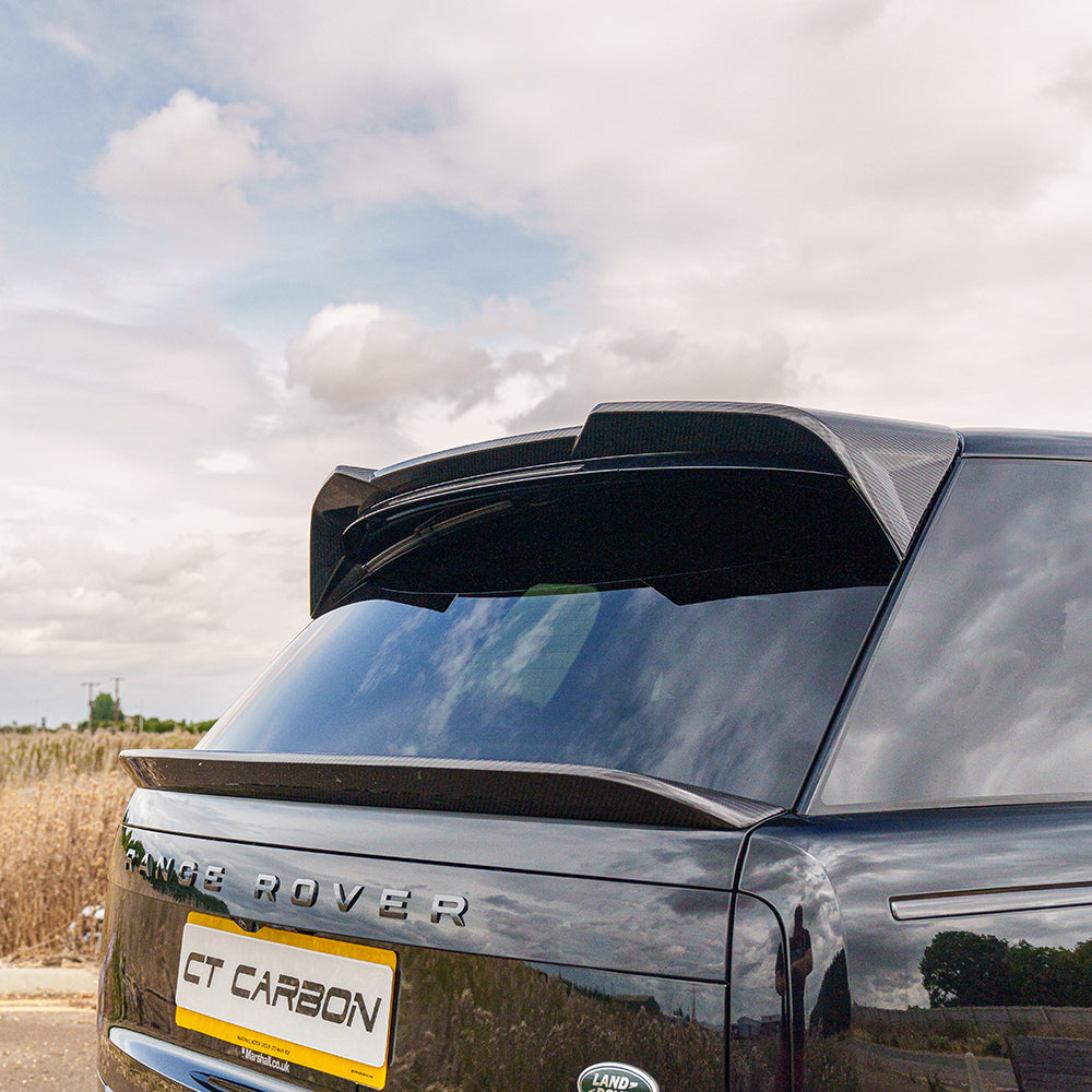 Range Rover L460 2022+ carbon fibre middle spoiler by CT Carbon, showing sleek, aerodynamic design on the vehicle's rear.