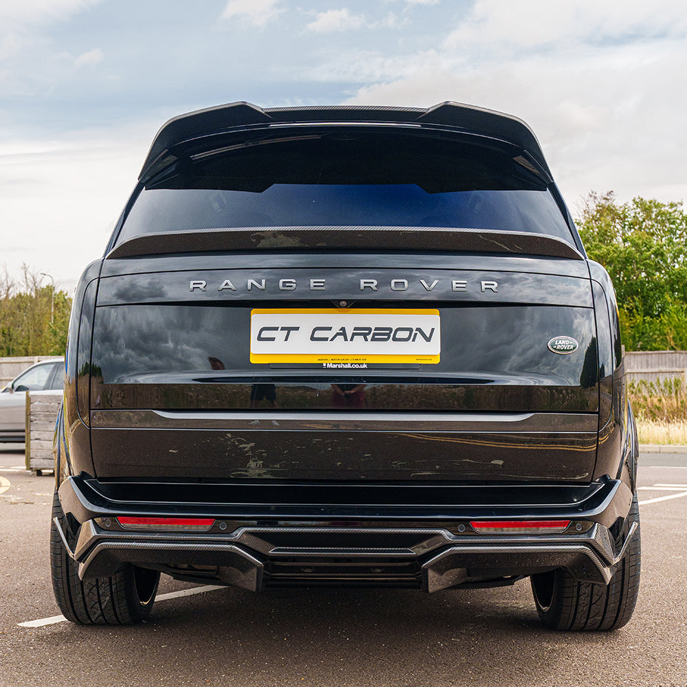Range Rover L460 2022+ carbon fiber roof spoiler by CT Carbon, showcasing the sleek, aerodynamic design on a luxury SUV.