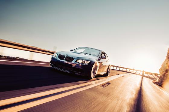 ST Suspension ST XTA PLUS coilovers with adjustable damping and top mounts installed on a BMW E92 M3, showing the suspension setup.